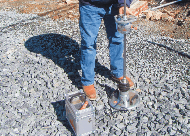 Figure 3. A lightweight deflectometer (LWD) testing deflection of ASTM No. 2 aggregate subbase.